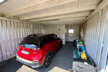 Wohntraum mitten in Geestland - Carport mit Abstellraum (69573)