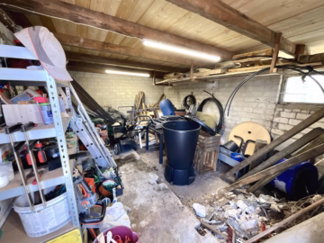 Familienhaus in ruhiger Lage zu verkaufen - Abstellraum an der Garage (43656)
