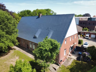 Mehrfamilienhaus mit Gewerbe zentral in Cadenberge - Rückansicht (79788)