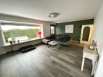 Wohnzimmer - Großzügiges Wohnen auf 1.600 m² Grundstück