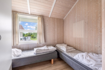 Exklusives Poolhaus im Wasser- und Landschaftspark - Schlafzimmer (64344)
