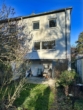 Rückansicht - Reihenendhaus mit Garten und Garage
