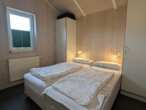 Schlafzimmer 1 - Der Traum vom eigenen Ferienhaus in Nordseenähe
