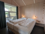 Schlafzimmer 2 - Der Traum vom eigenen Ferienhaus in Nordseenähe