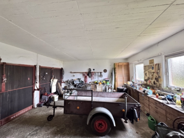 Ruhiges Wohnen am Wald - Doppelgarage mit Werkstatt (66116)