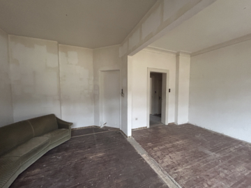 Mehrfamilienhaus mit 7 Wohnungen und Lager in Lehe - Wohnzimmer Beispiel 3 (37927)