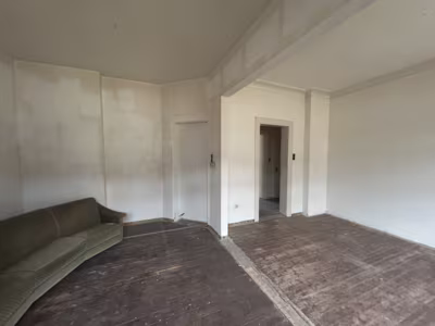 Mehrfamilienhaus mit 7 Wohnungen und Lager in Lehe - Wohnzimmer Beispiel 3 (85292)