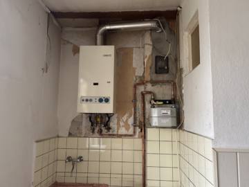 Mehrfamilienhaus mit 7 Wohnungen und Lager in Lehe - Heiznische 2 Etagenheizung (37929)