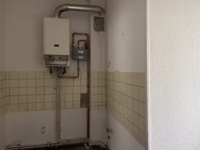 Mehrfamilienhaus mit 7 Wohnungen und Lager in Lehe - Heizung 2 Zi.-Wo Beispiel (85301)