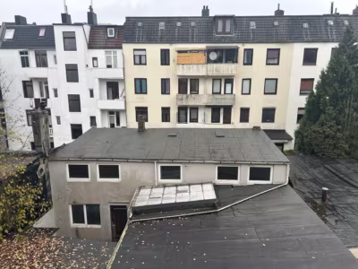 Mehrfamilienhaus mit 7 Wohnungen und Lager in Lehe - Ausblick zum Hintergebäude / Lager (85305)