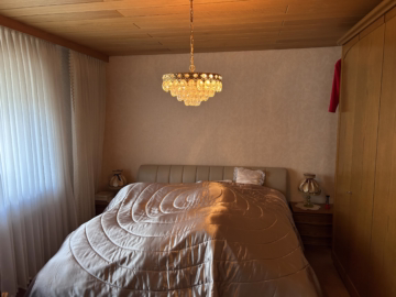 Haus + Wintergarten + Ausbaureserve im Mischgebiet - Schlafzimmer am Wohnzimmer (56220)