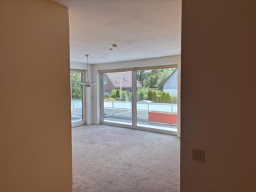 Architektur-Highlight am Bürgerpark mit Tiefgarage - Diele Blick zum Wohnzimmer (69469)