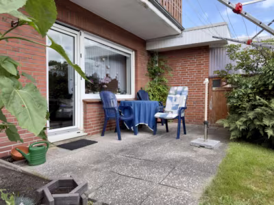 Vielseitiges Immobilien-Duo - Terrasse Mietwohnung 1 (80560)