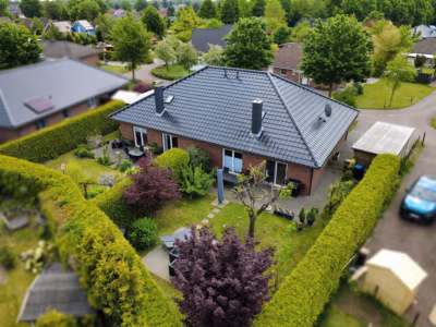 Vermietetes Doppelhaus in gefragter Lage - Gartenansicht links (83628)