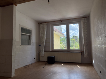 Altbauhaus aus 1892 mit 2 freien Wohneinheiten - Wohnzimmer EG (62412)